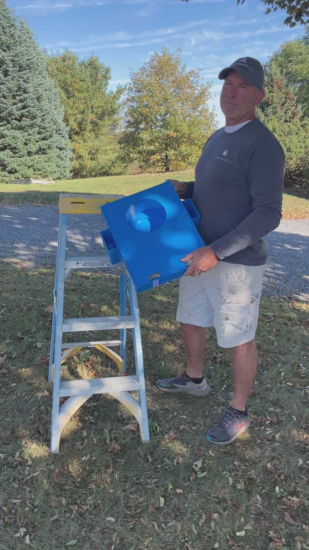 Load video: Third Hand Pro founder Jamie Golden demonstrating how to attach the P3H Pro work station to a ladder with slots